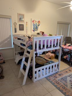 Compact bunk bed with mattresses