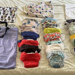 20 Cloth Diapers, 4 Diaper Bags, 1 Diaper Sleeping Skirt