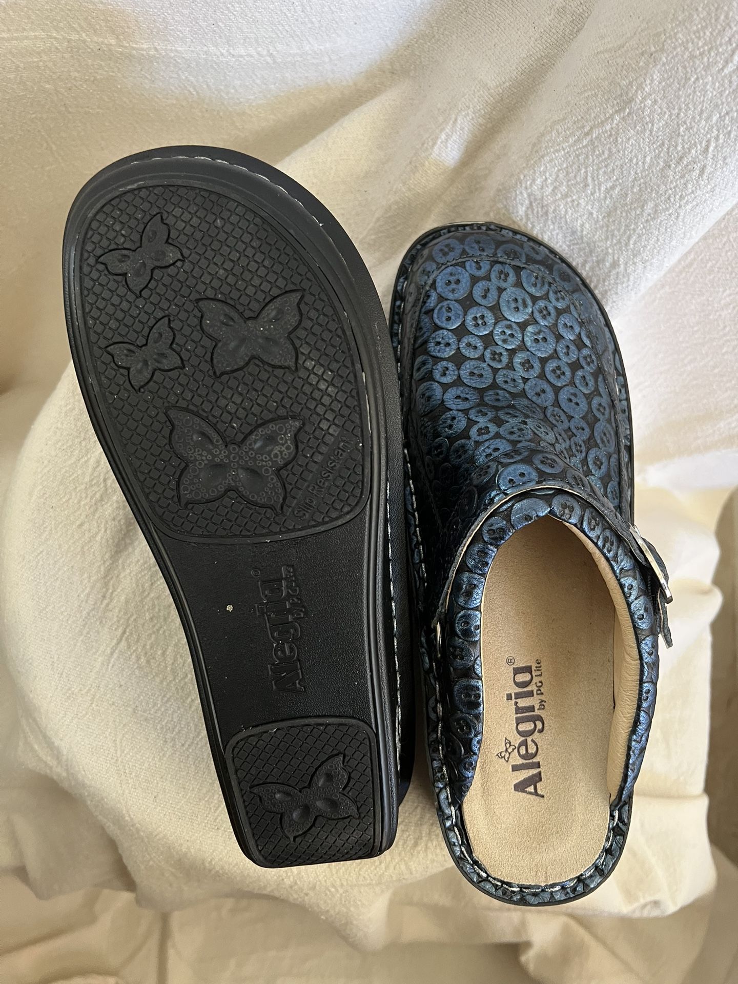 Alegria by PG Lite - black with blue circle/button design with strap and buckle