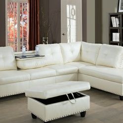 Brand New White Leather Sectional With A Drop Down Table Built In Cup Holders & Storage Ottoman 