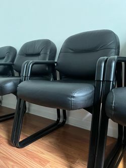 5 black leather office chairs