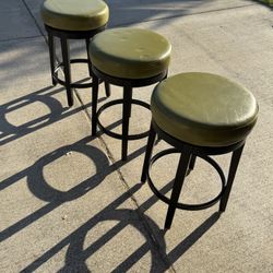 Three Safe Green And Black Swivel Bar Stools