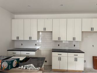 Gabinetes en color blanco y gris