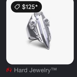 This is the Hard Jewelry Catacomb Sword Ring, featuring a striking 3D medieval sword set against an organic, distressed skull and bone motif.