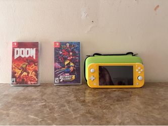 Nintendo switch lite with case and 2 games