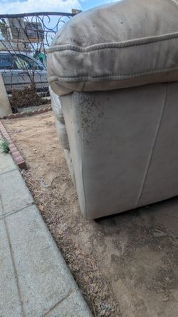 Free sofa some cat scratches on the right side not notice a lot and another small side below