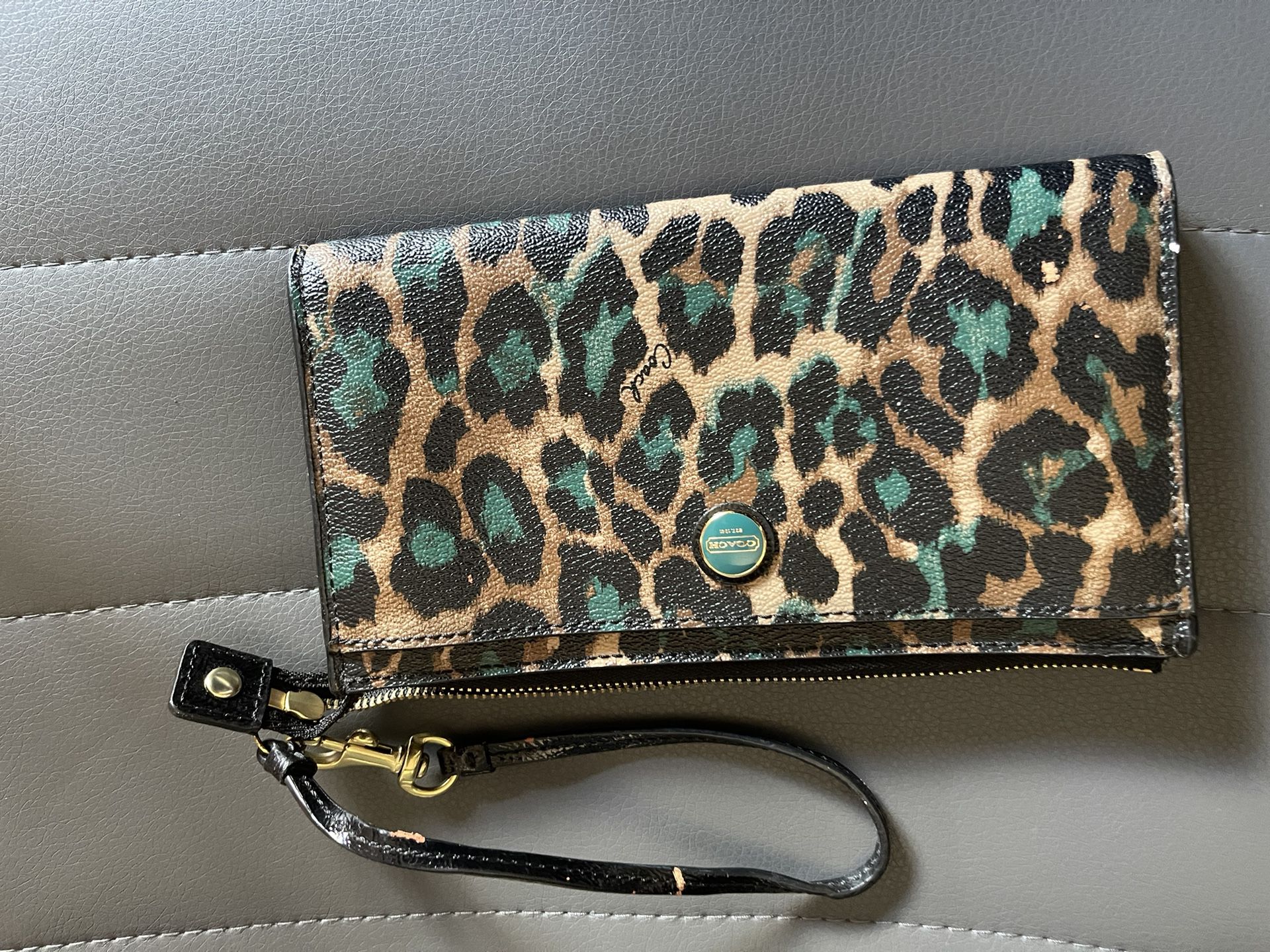 Turquoise And Brown Coach Wristlet