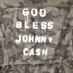 Camouflage Jacket: Drawstring Waist, Pockets, “God Bless Johnny Cash”
