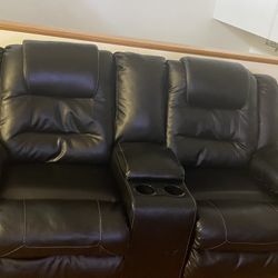 signature design by Ashley power reclining sofa &  loveseat. 