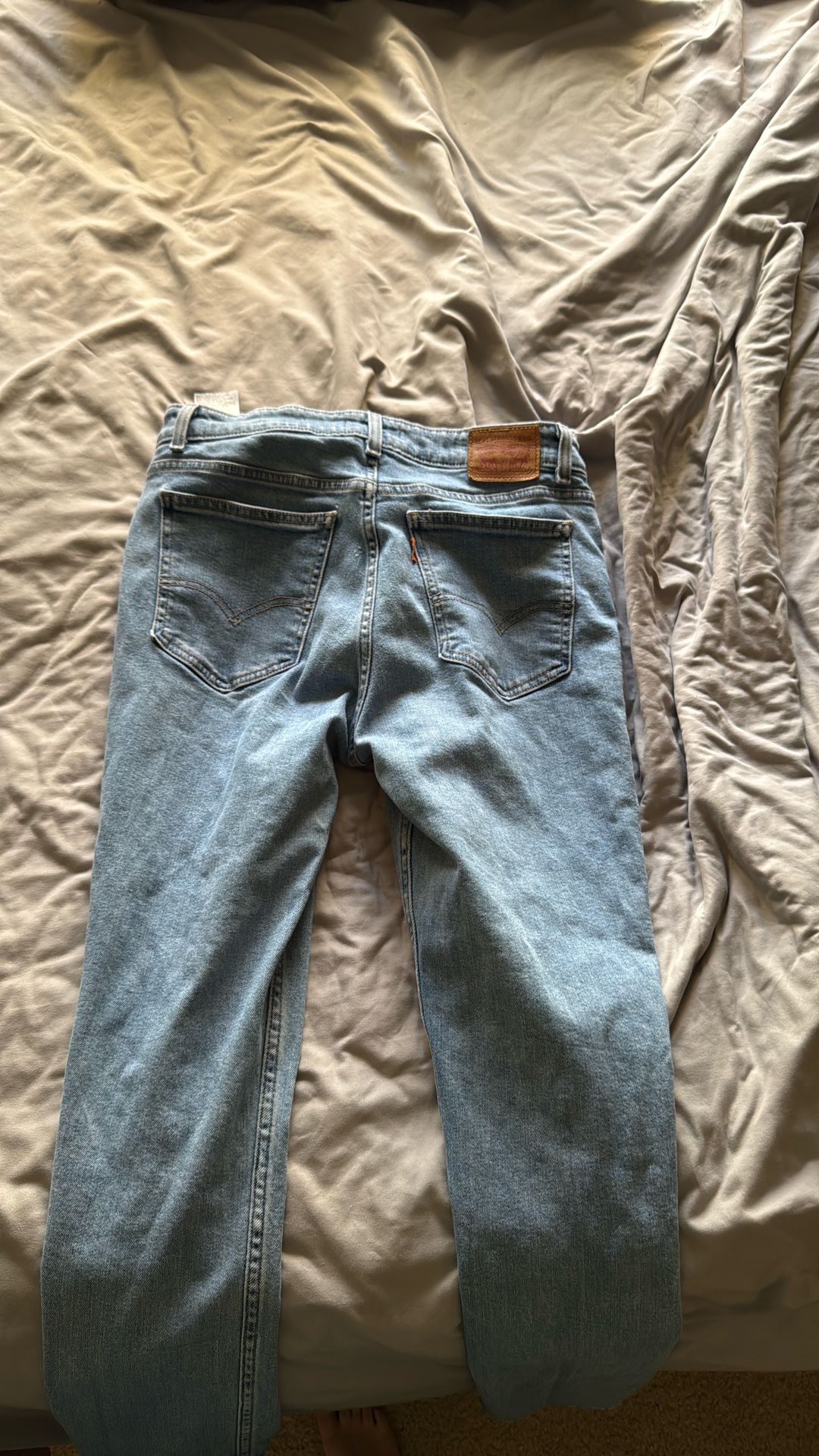 Levi jeans they are 30 waist and then 32 too long