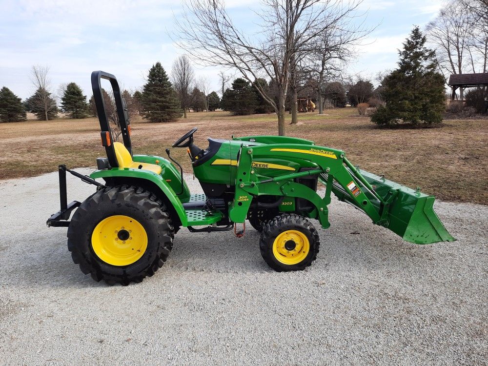 John Deere 4x4 Tractor & Loader