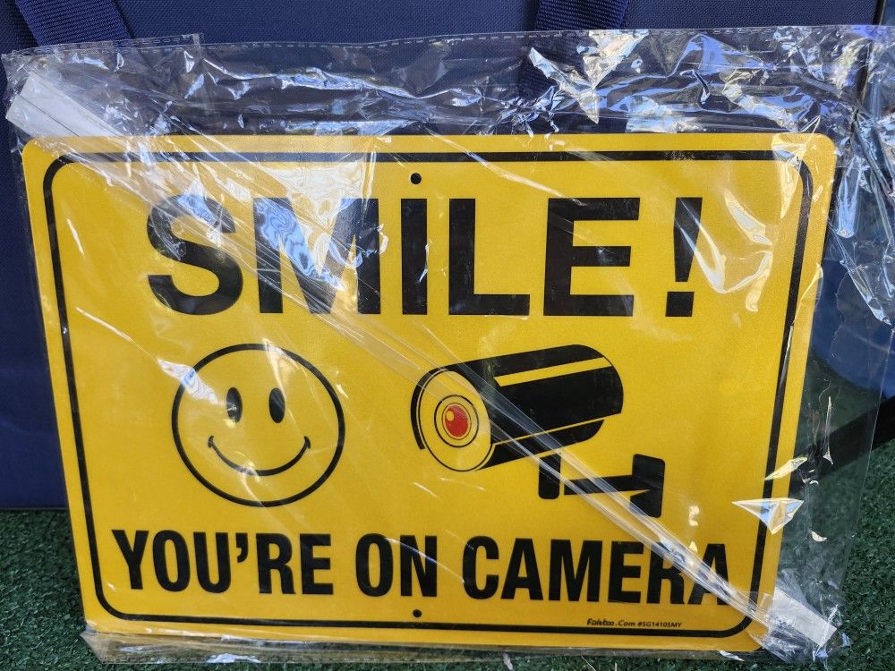 Smile You're On Camera Sign With Stake