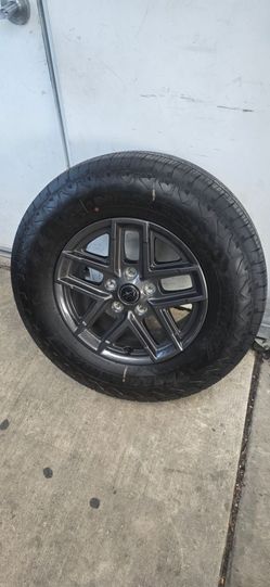 TIRES + RIMS FOR SALE Size: 245/75R17

17" graphite gray rims Excellent condition