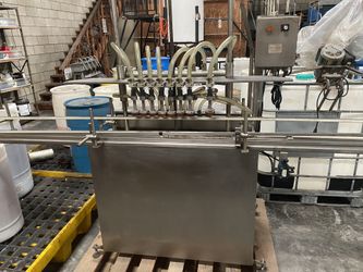 Ron Ungar Engineering - Bottle Filling Machine Model 2101-8 in line Pressure Filler