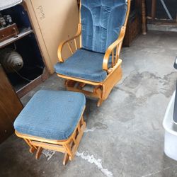 Old Rocking Chair With Rocking Foot Rest And An Old Desk 