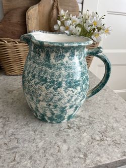 Vintage ceramic pitcher $25