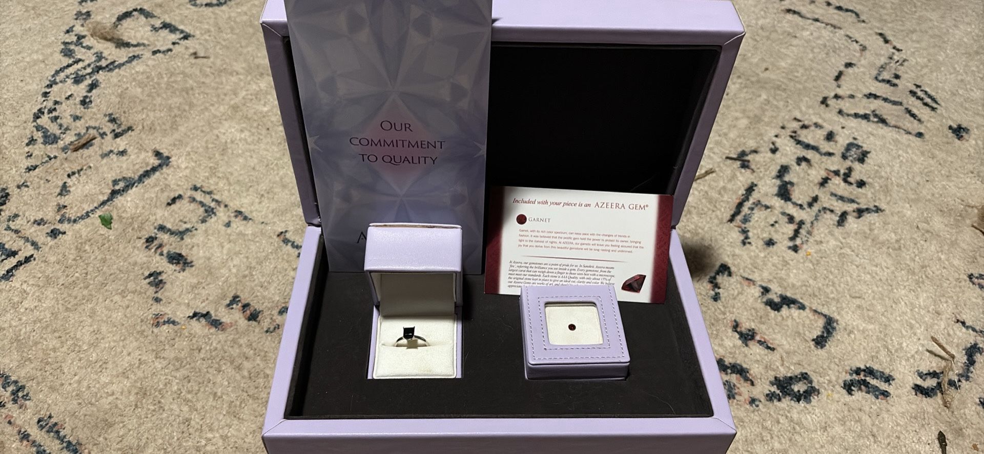 Black onyx solitaire with ruby in 18K white gold Ring