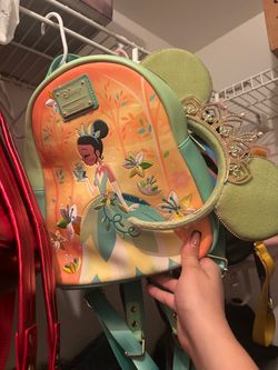 Disney loungefly and Minnie ears with tiara / Tiana