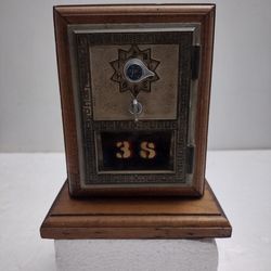 Vintage post office box is framed in wood 