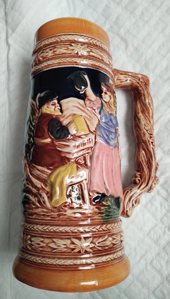Beer stein made Japan maiden serves beer 9 inches tall. used