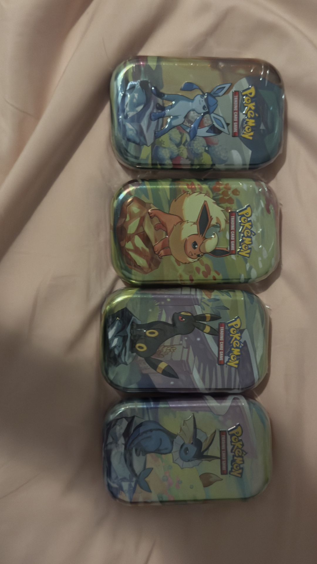 Prismatic Evolutions Mini Tins