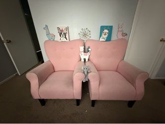 Pink 2 piece couch set.
