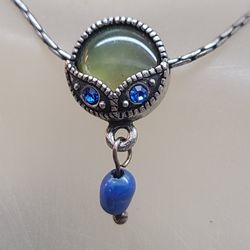 INDIGO BLUE ABALONE WITH FRESHWATER PEARL 