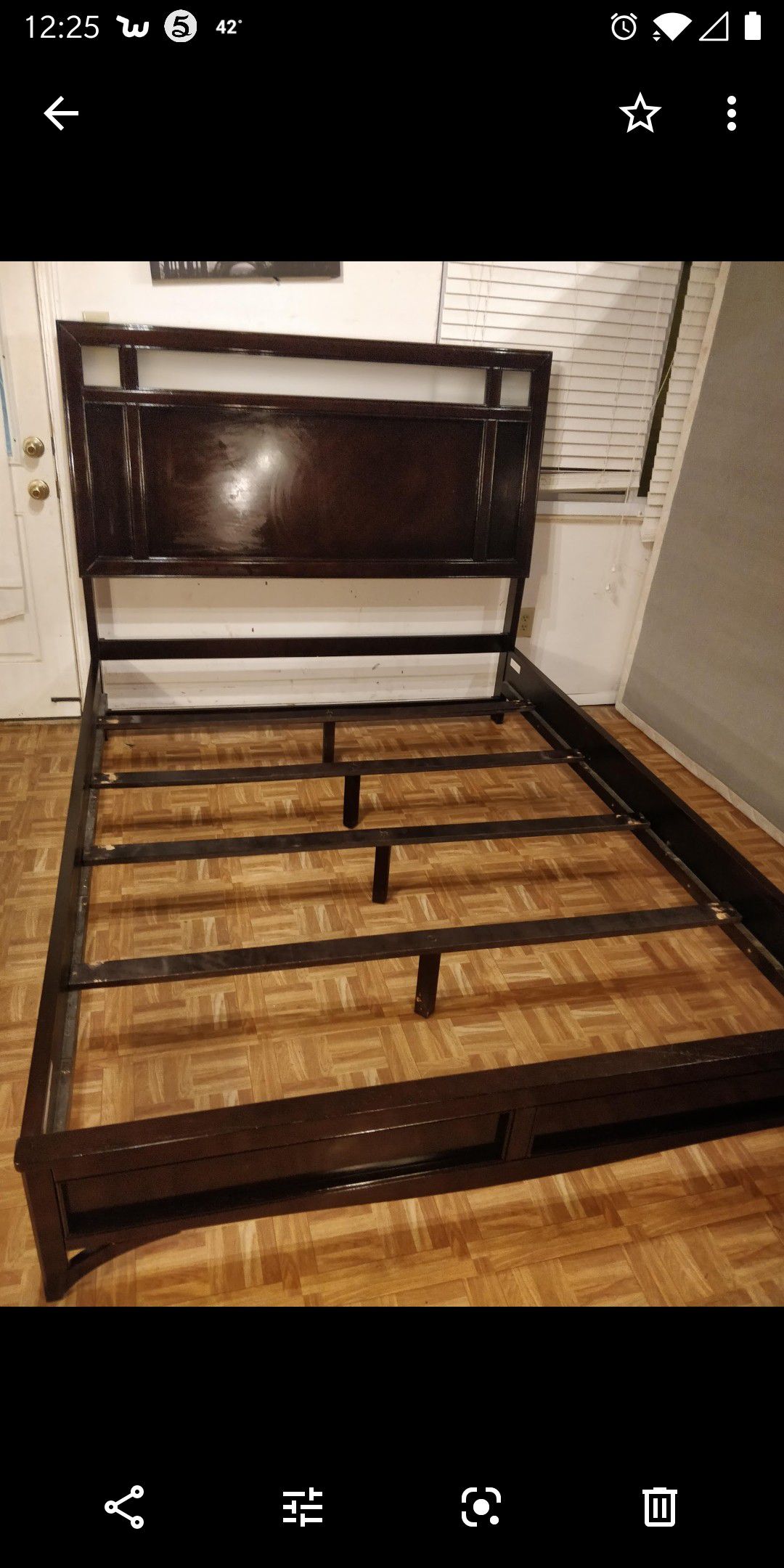 Nice modern wooden Queen bed frame in good condition.
