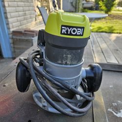 Ryobi R163G router.  1/4 inch Collet, 8.5 Amp motor.