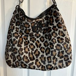 Tory Burch grey leopard hobo bag with black leather trim and hematite hardware.