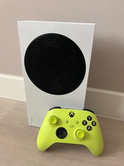 Xbox Series S with neon green controller