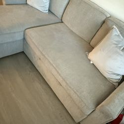 Light Grey Sleeper Sectional With Storage Chaise 