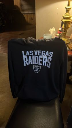 Extra large youth used raiders sweater, only used once then hung in the closet