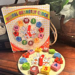 Geometrical Clock.  Shapes Puzzle. Learn To Tell Time. 