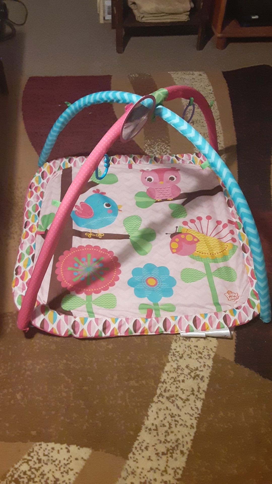 Bright Starts tummy time activity play mat for a baby girl. This is a very clean item!