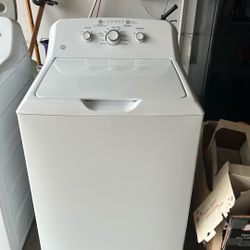 GE washer and dryer and  Black Refrigerator  like new