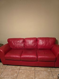 Red leather sofa and chair.