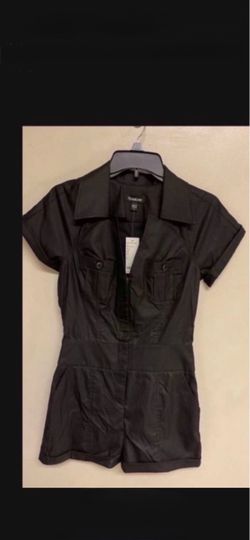 CA. BEBE SIZE SMALL. BLACK ROMPER. NOT WORN  WITH TAGS