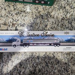 2 Mobil Trucks. One Low Price. Never Opened 