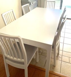 IKEA TABLE  WITH TABLE EXTENSION AND 6 CHAIRS