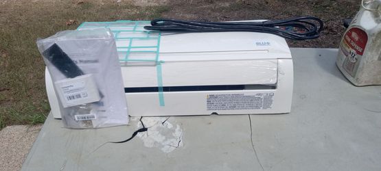 Brand new NG Blu Air conditioner and heater