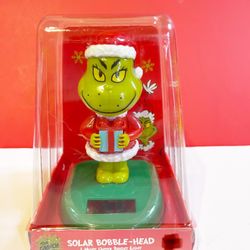 The Grinch Sola Bobble Head - Moving in the bright light
