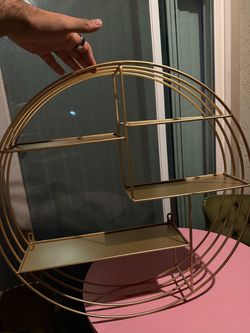 Circular gold shelf