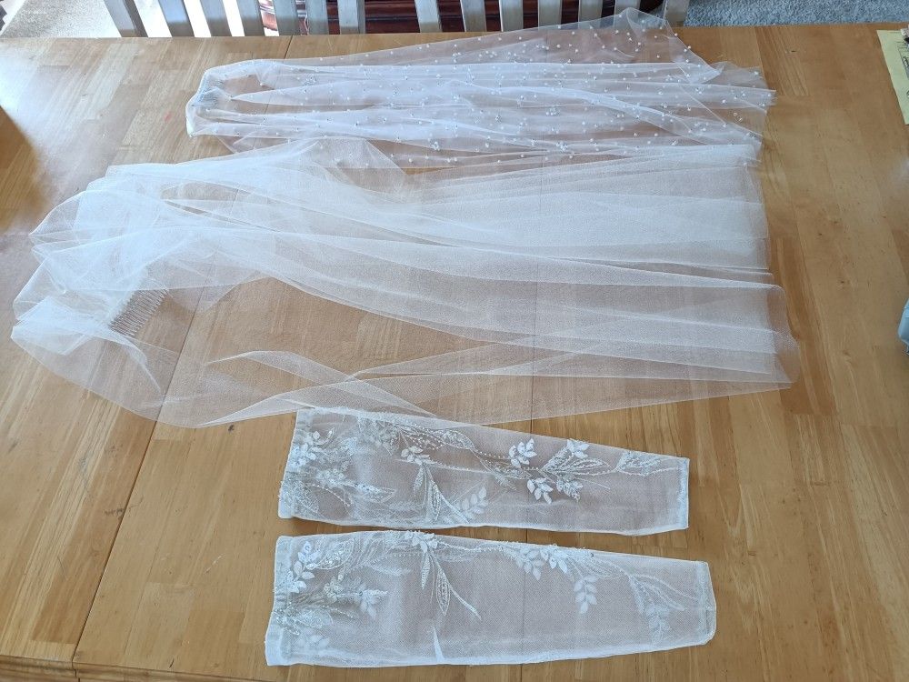 Bride accessories handmade sleeves & veil, 3 pieces
1 pair of handmade sleeves for $40
1 handmade tulle veil $30
1 Pearl veil $20
Details for each i