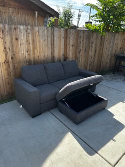 Free Delivery! Black Couch and ottoman with storage