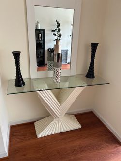 Glass table with concrete base