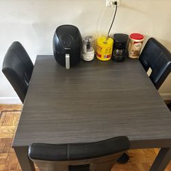 Kitchen table with three chairs