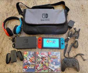 Nintendo Switch console bundle with accessories & games, case, 32GB SD Card