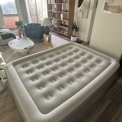 Coleman Queen size air mattress with built in air pump