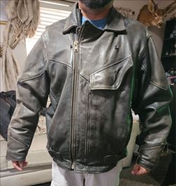 dark brown or black leather flight or bomber jacket